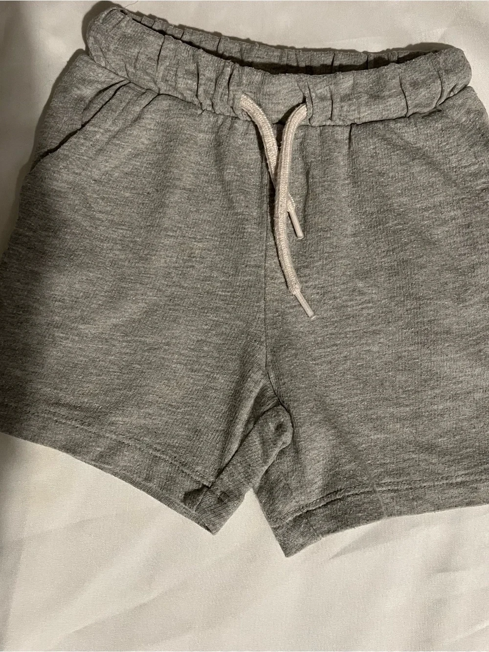 Set of Seven Old Navy Shorts in Neutral Colors in Size 18-24 Months